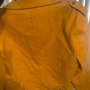 A yellow leather jacket XXL only worn twice. I loved it!